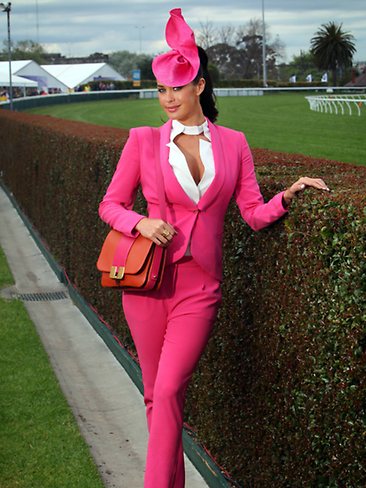 Megan Gale grabs attention in eye-popping pink!!