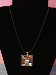 Silver Square Pendant filled with metallic coloured stars