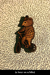 bear on a bike